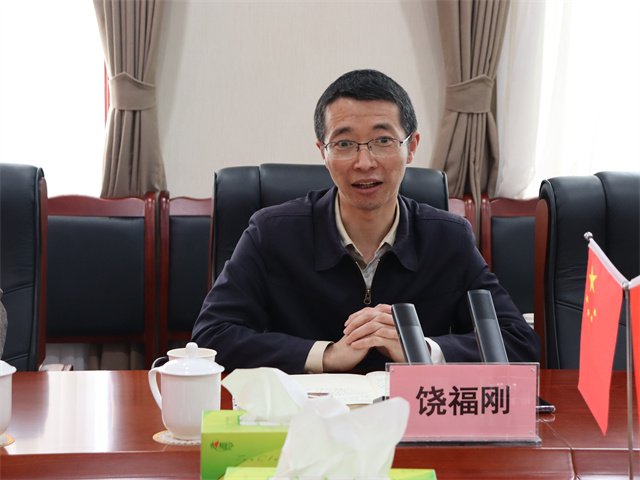 鄧華會見宜賓市供銷社黨委書記、理事會主任饒福剛一行